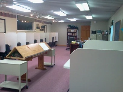Individual study desks and bookshelves at the Academy in 2012.